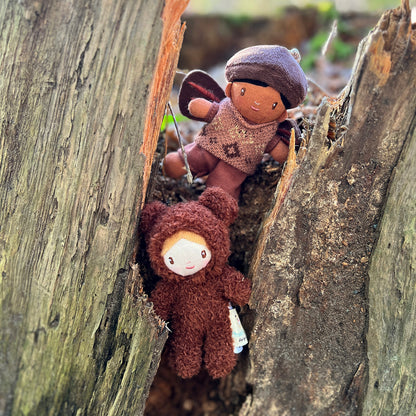 Threadbear Design Heidi Bear Little Peeps Doll and the Forrest Tooth Fairy in the garden.  A pocket size soft toy doll wearing a furry bear suit.  Perfect for dolls houses and imaginative play.