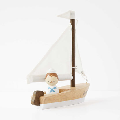 Wooden Sailing Boat and Captain