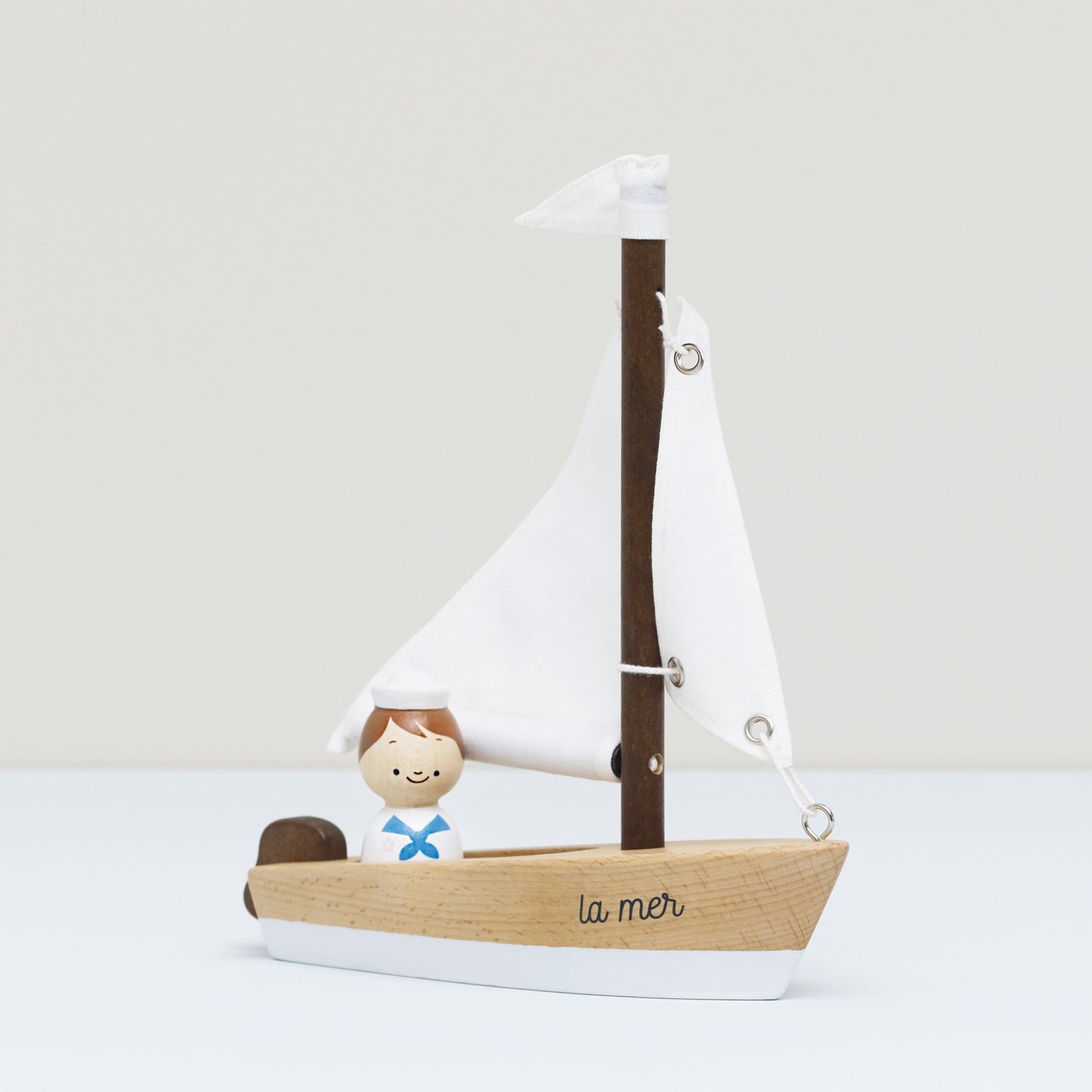 Wooden Sailing Boat and Captain